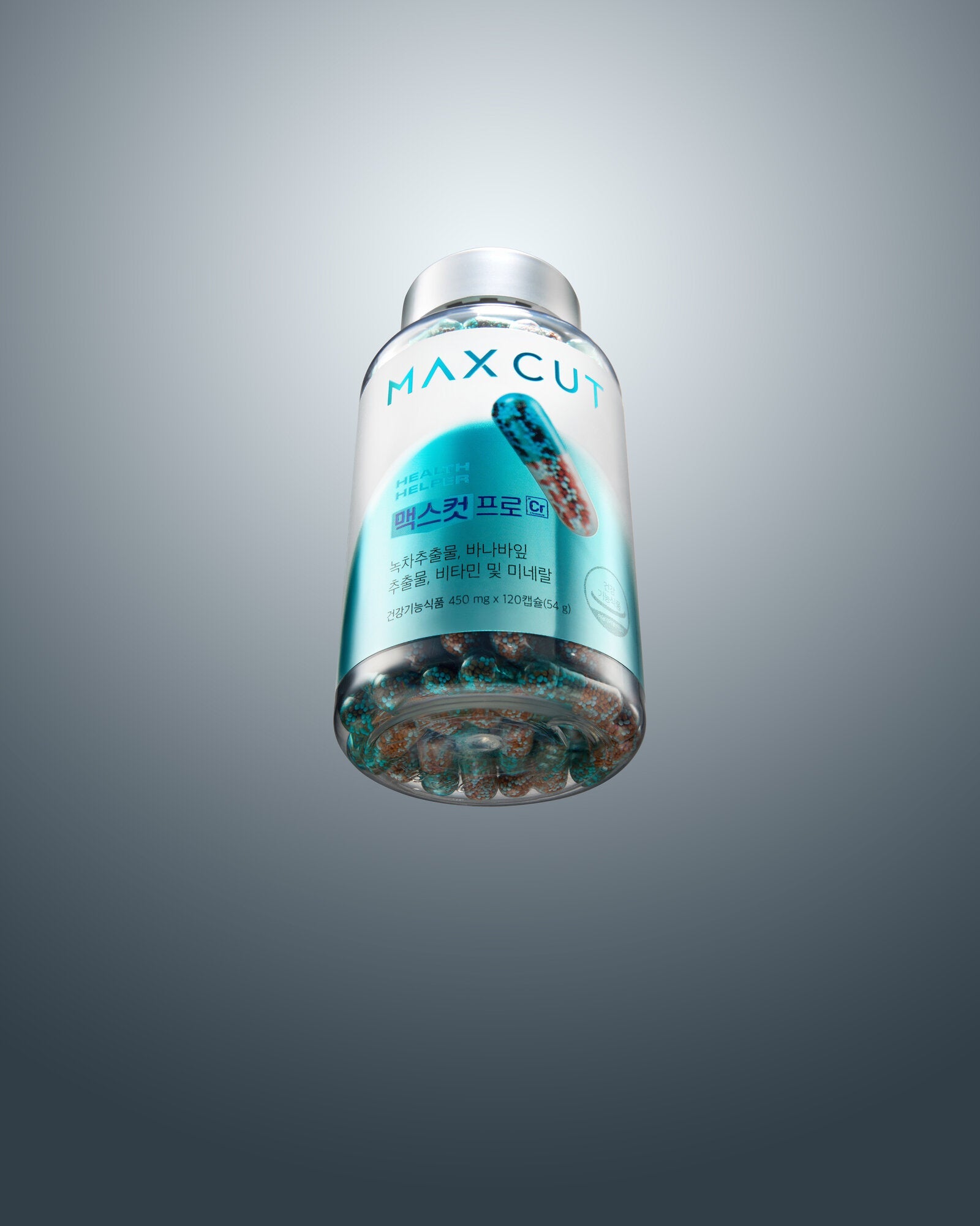 MAXCUT Pro Chrome bottle on reflective surface
